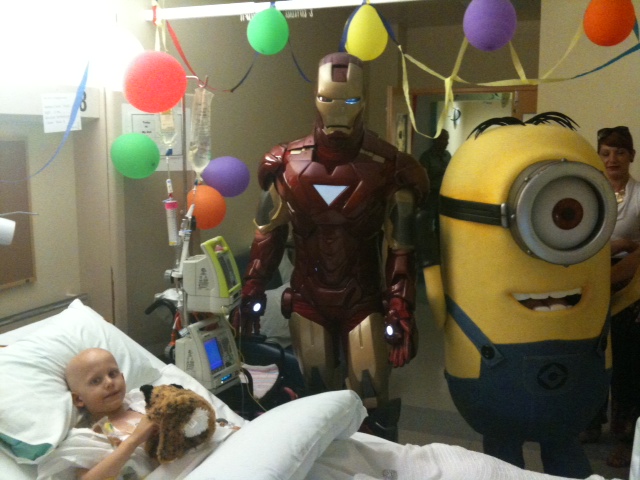 Iron Man and a Minion came to visit Ethan. Perfect. Ethan loves the game 'Minion Rush' on his ipad